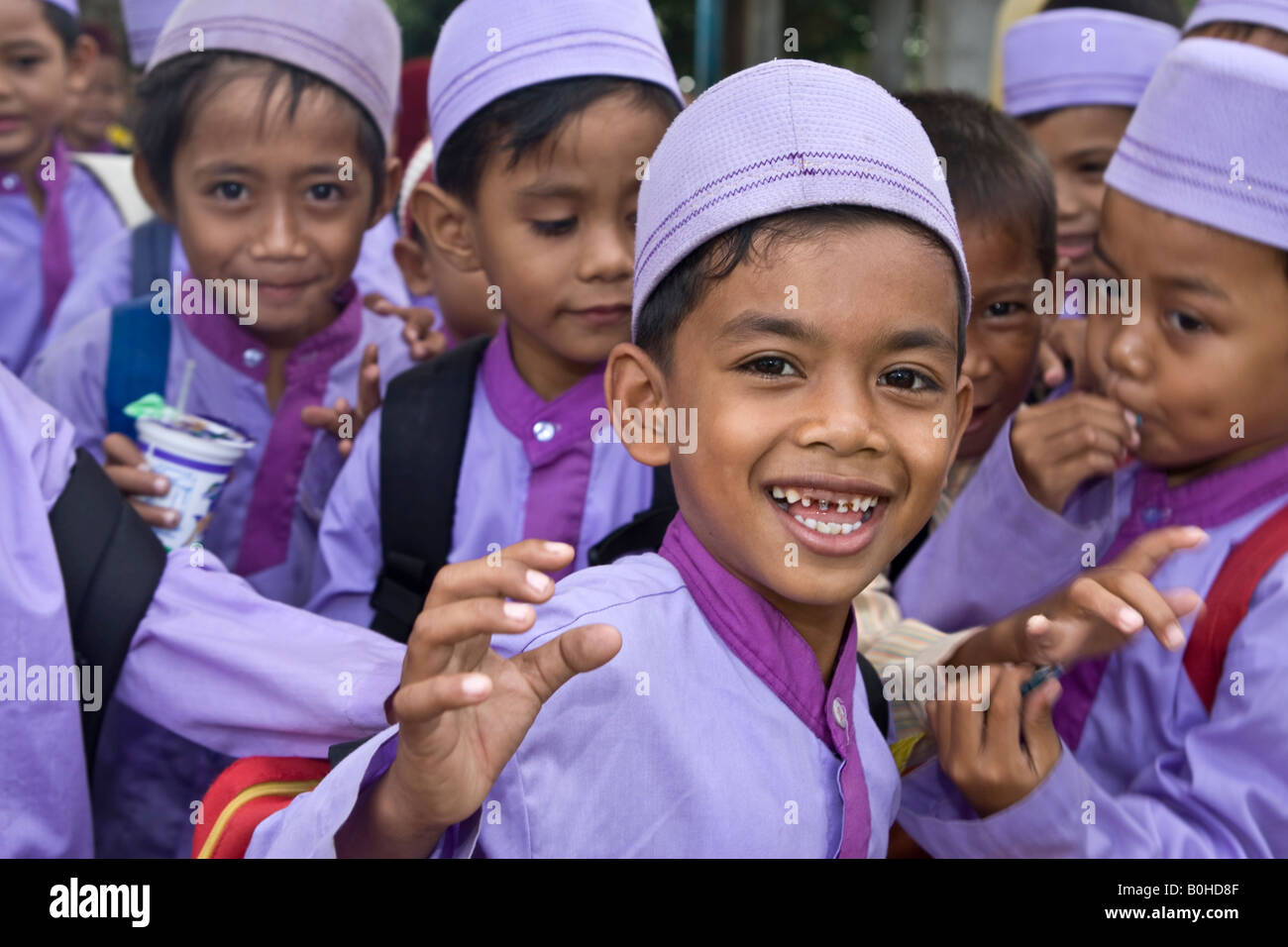 Muslim schoolchildren in front of their school, Matram, Lombok Island, Lesser Sunda Islands, Indonesia Stock Photo