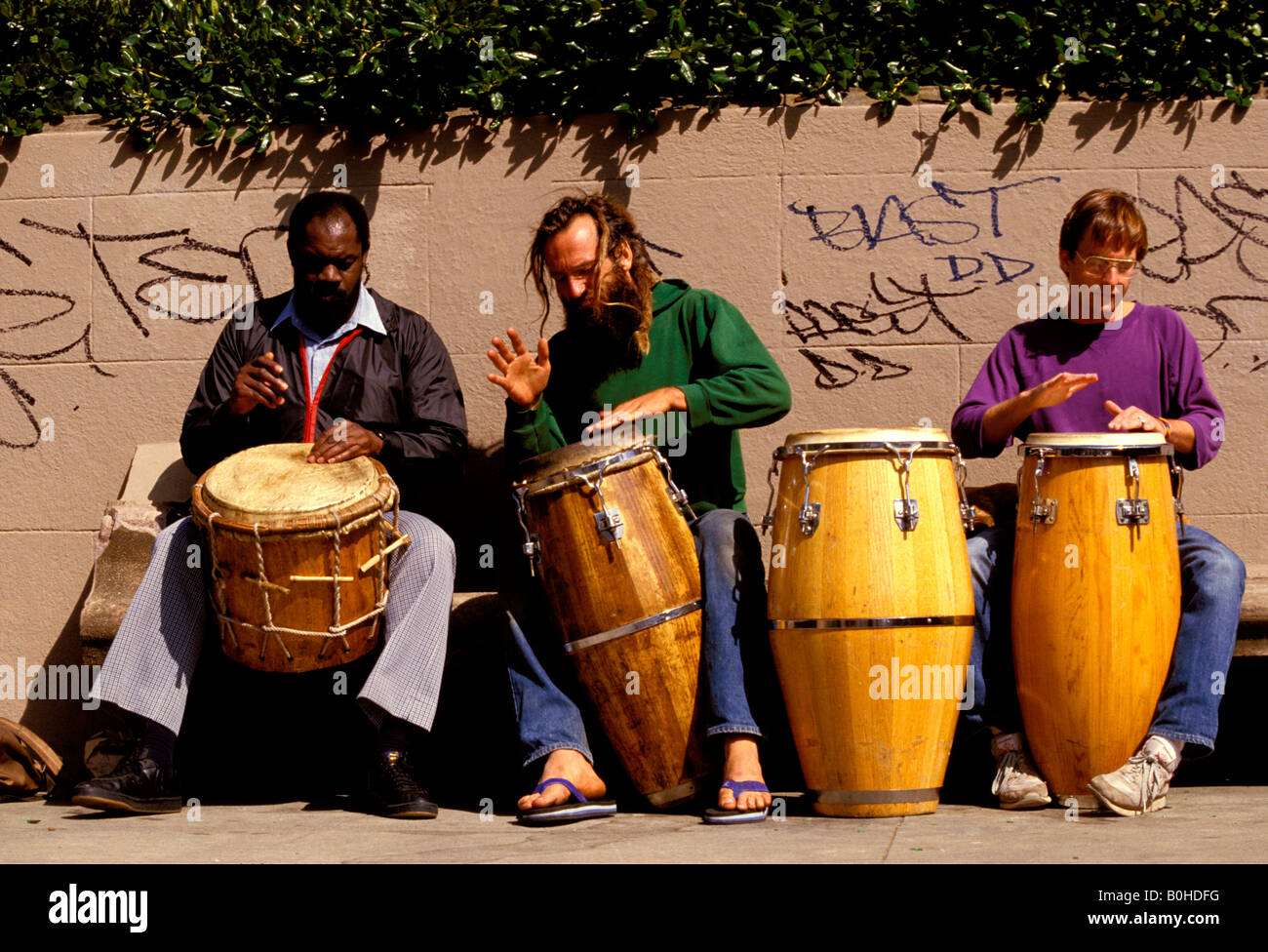 Three hippy drummers busking in the street at Haight Ashbury, San  Francisco, California, USA Stock Photo - Alamy