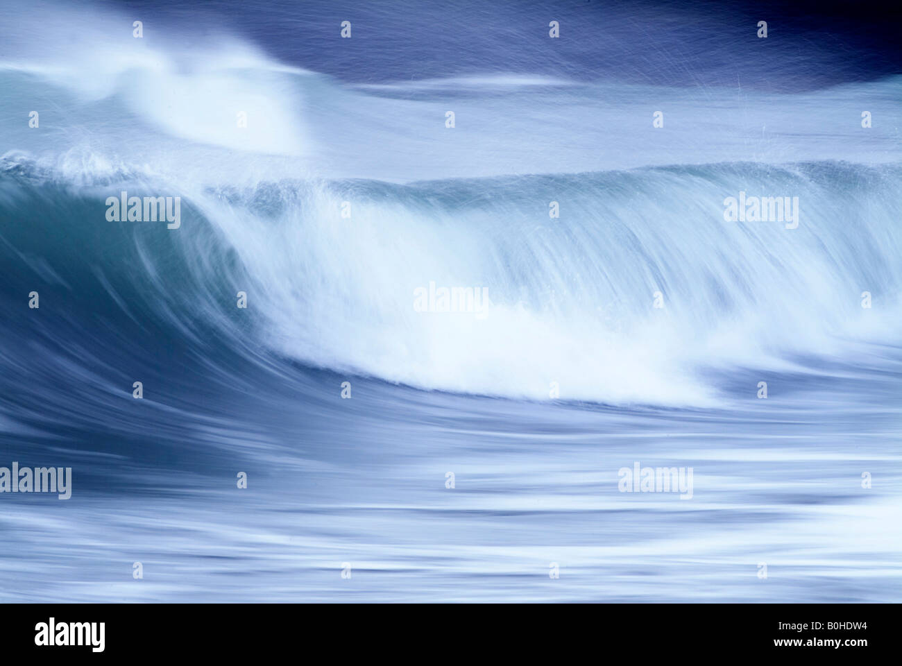 Waves crashing on a beach, blurry, Atlantic Ocean Stock Photo