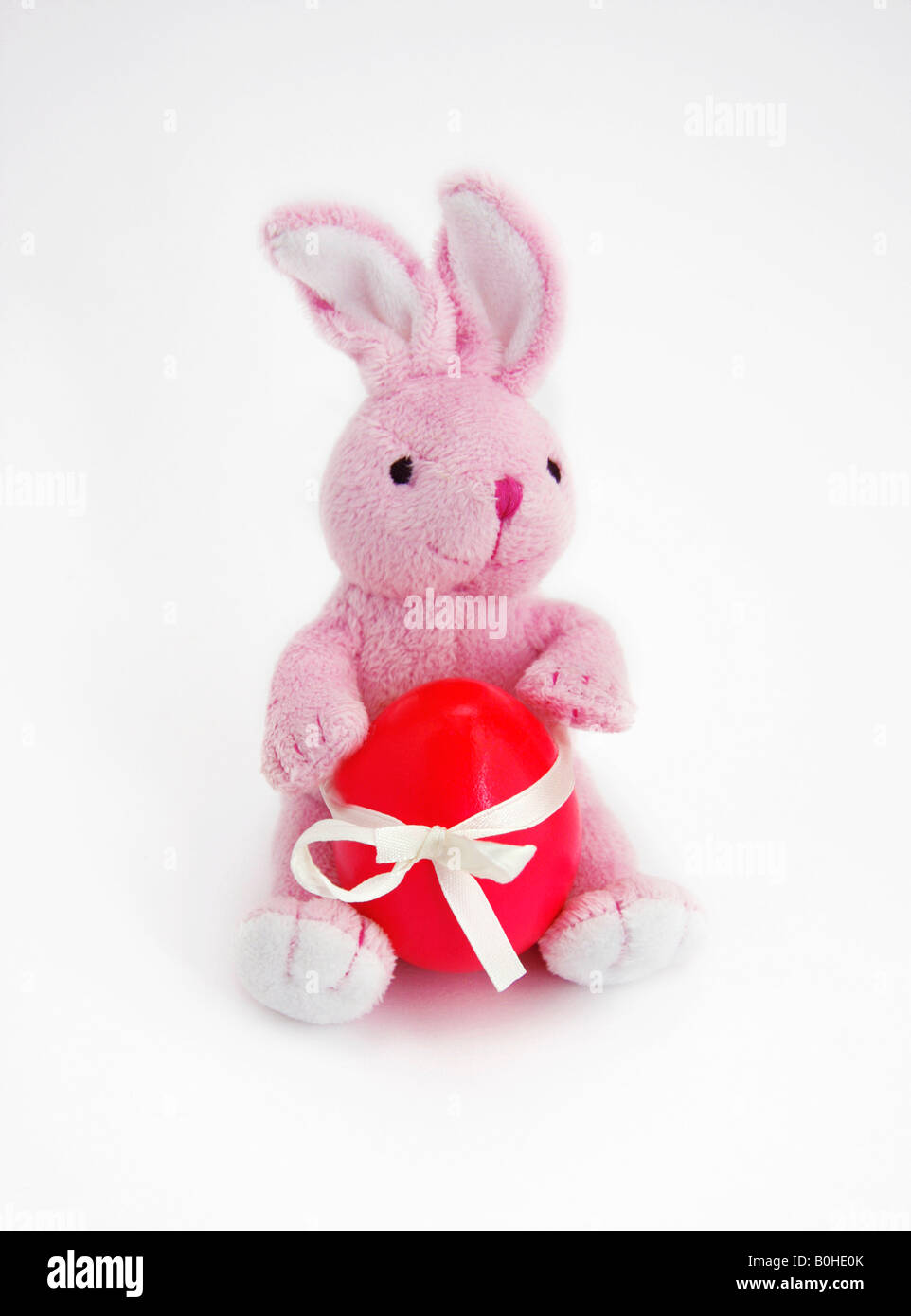 Easter bunny and an Easter egg Stock Photo