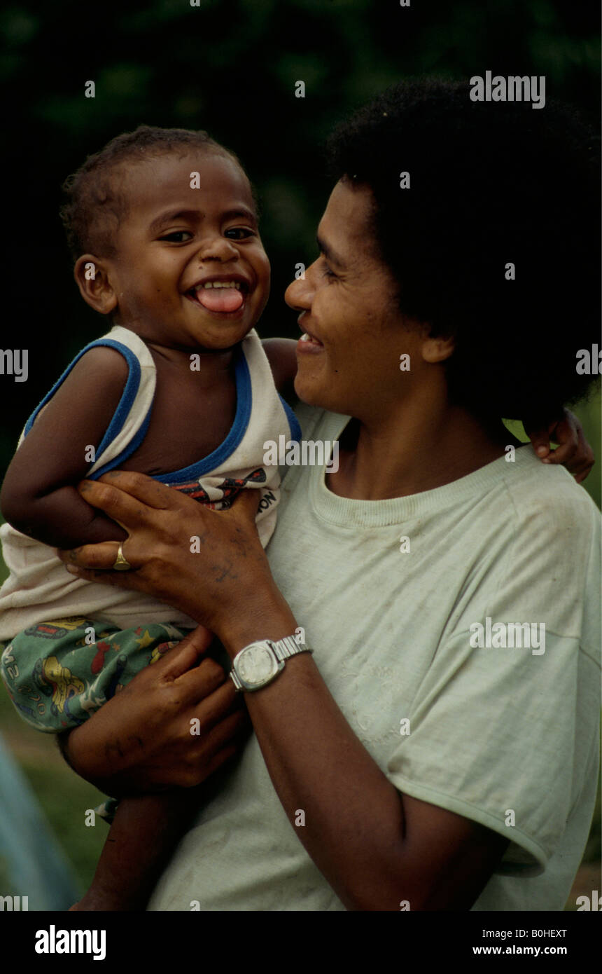A portrait of a Fijian mother with her son, Abaca, Fiji. Stock Photo
