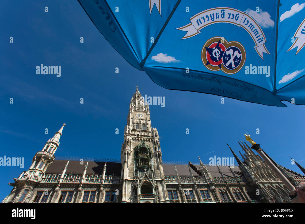 Neues Rathaus, New Town Hall and street cafe umbrella at Marienplatz Square, Munich, Bavaria, Germany Stock Photo