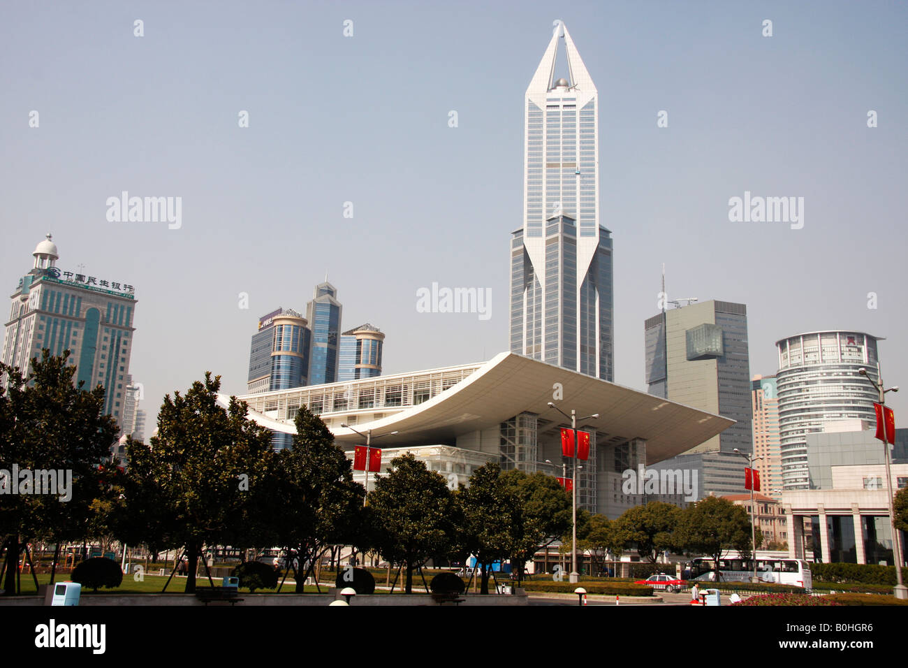 Shanghai's Grand Theatre in the People's Park or Renmin Gongyuan, is backed by spectacular modern High Rise buildings Stock Photo