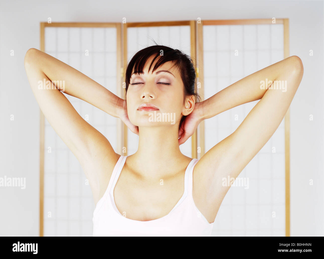 Young woman relaxing and meditating Stock Photo