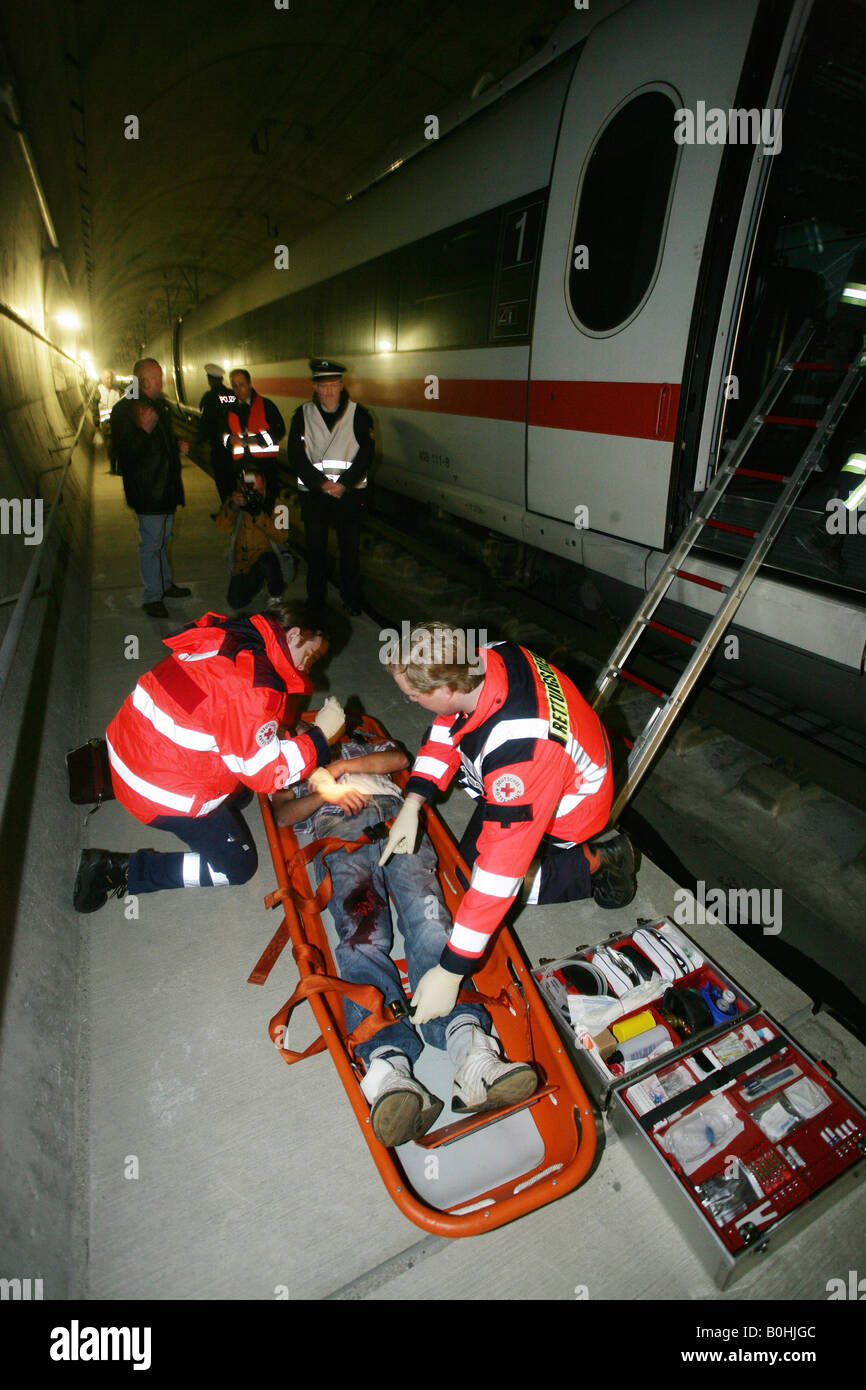 Paramedics and stretcher, rescue drill conducted in an ICE high-speed or bullet train tunnel, Germany Stock Photo