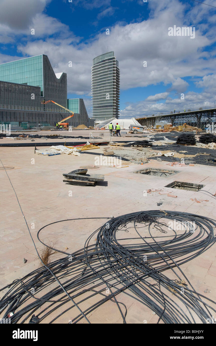 Cable lying at a building site, in front of the Torre del Agua or Water Tower, designed by architect Enrique de Teresa for Expo Stock Photo