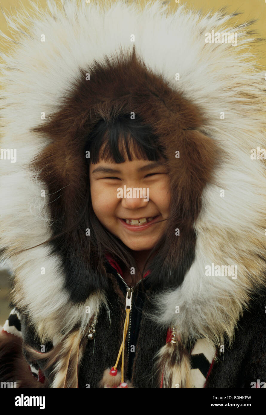 An Alaskan Inupiat Eskimo girl wearing a caribou skin parka with wolverine  fur trim, Barrow, Alaska, USA Stock Photo - Alamy