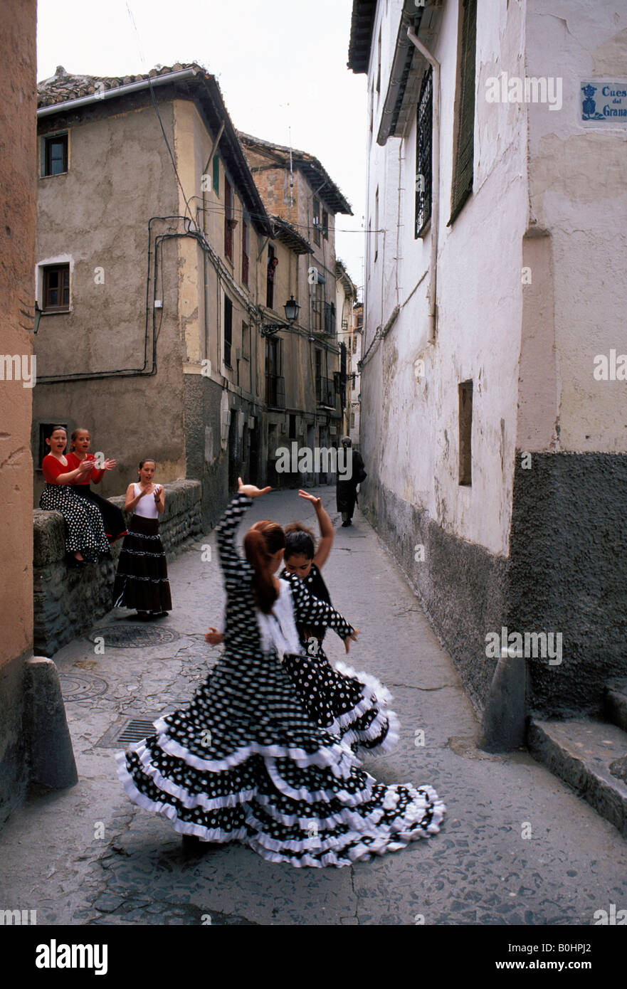 Young flamenco dancers in the street, Granada, Spain. Stock Photo