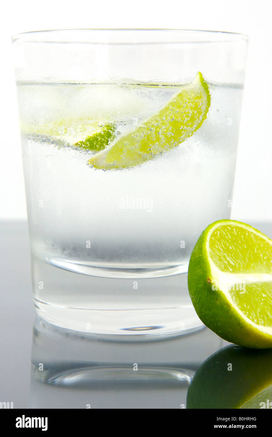 Ice water with a twist of lime Stock Photo - Alamy