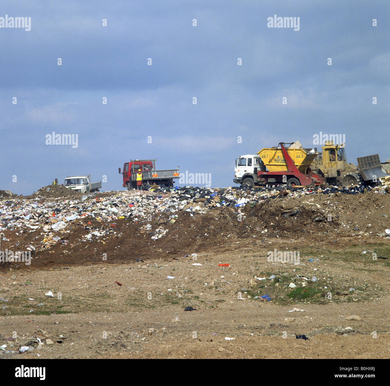 Refuse Vehicles on a Tip Stock Photo Alamy