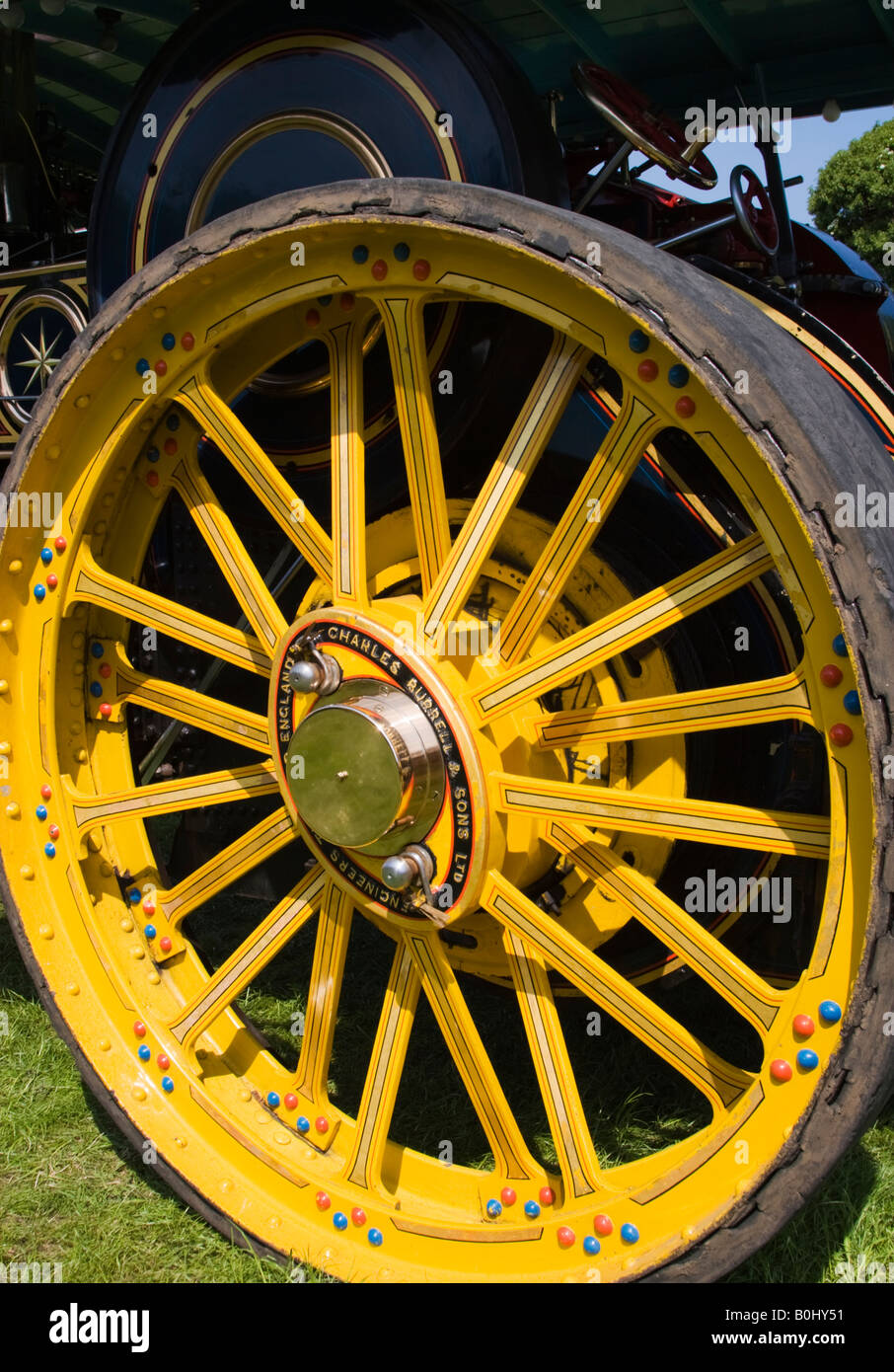 Large yellow wheel from a showman's traction engine Stock Photo