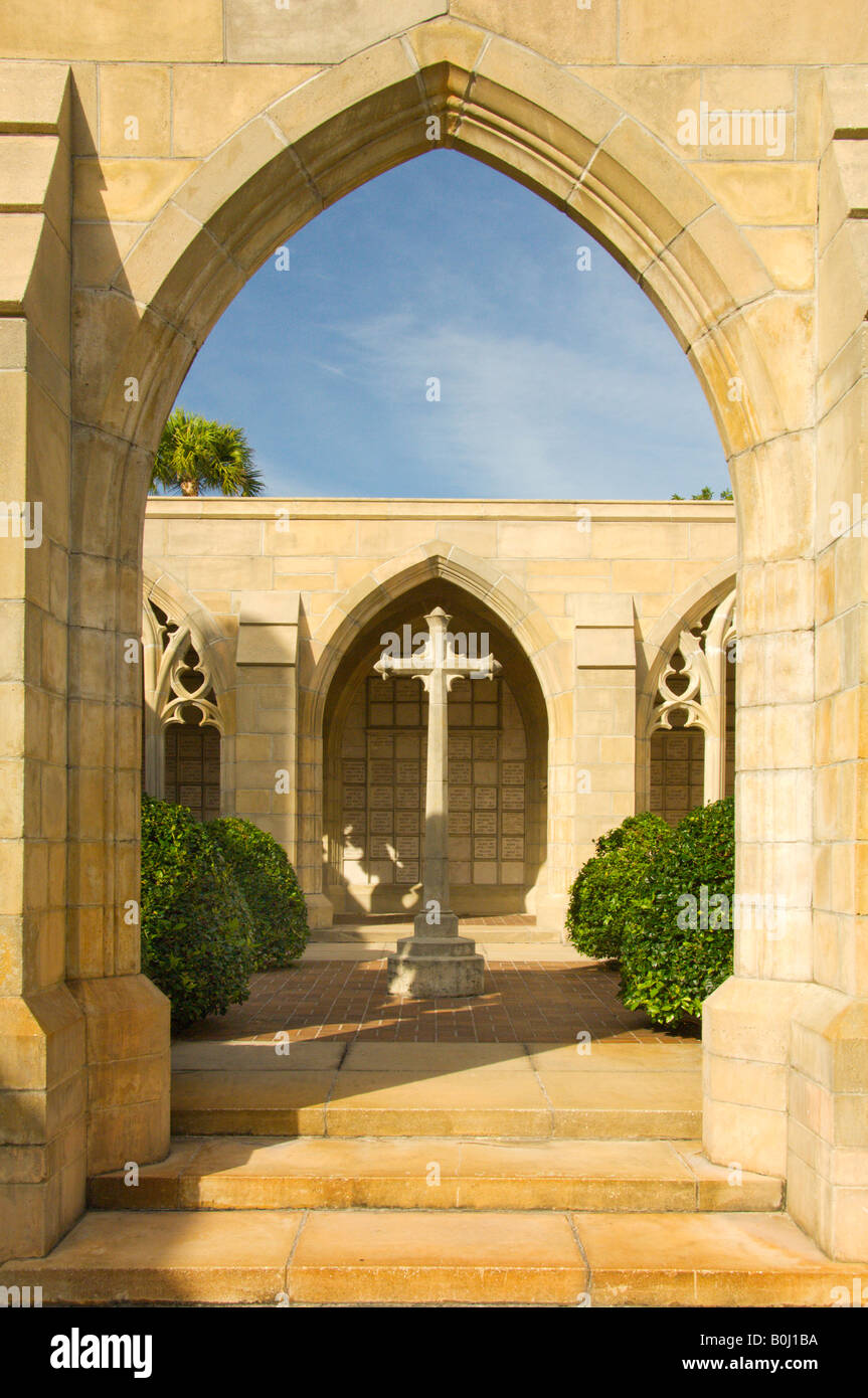 An archway into an exterior courtyard at The Episcopal Church of Bethesda by the Sea in Palm Beach Florida USA Stock Photo