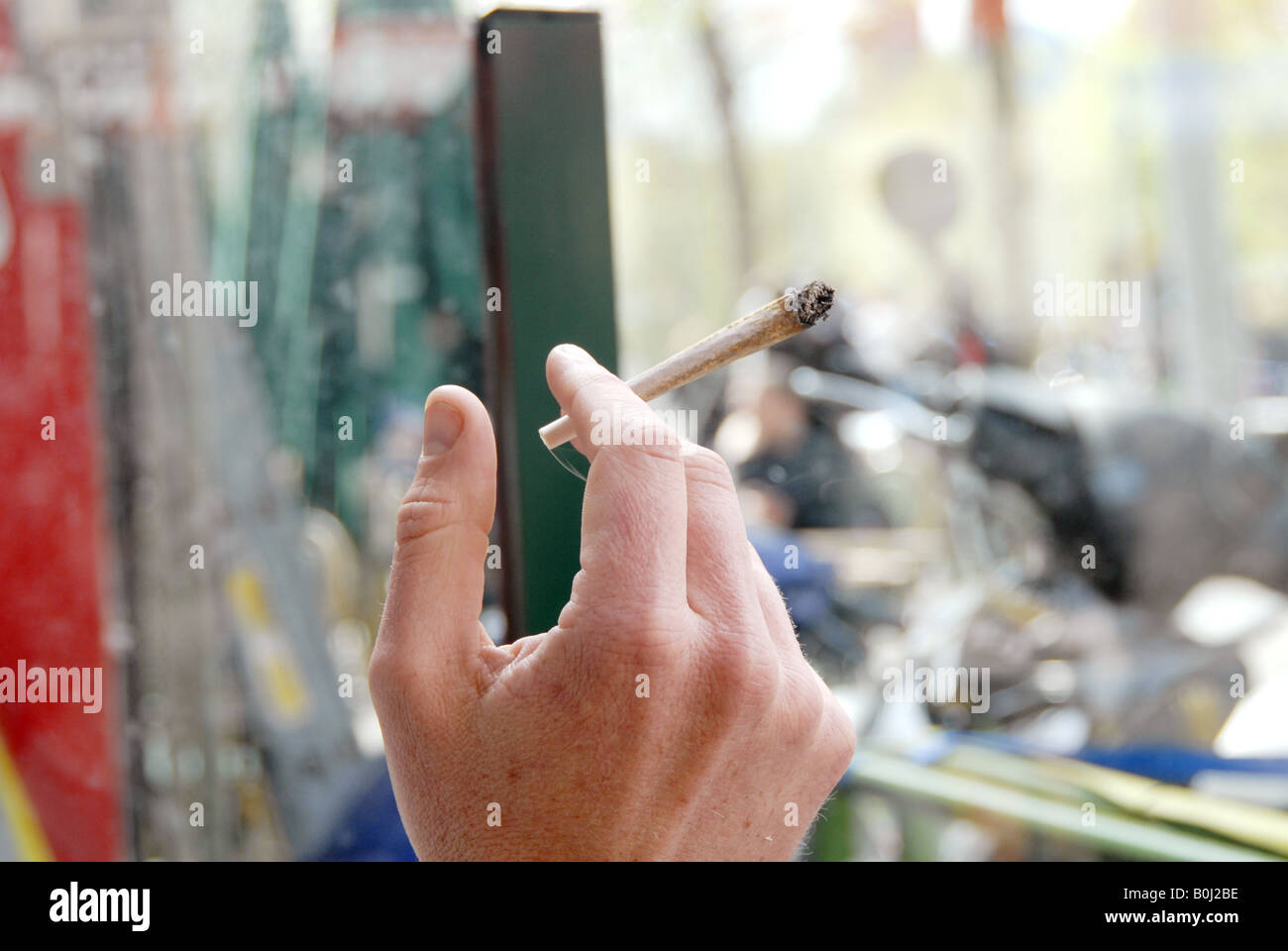 Smoking a hashish joint Stock Photo