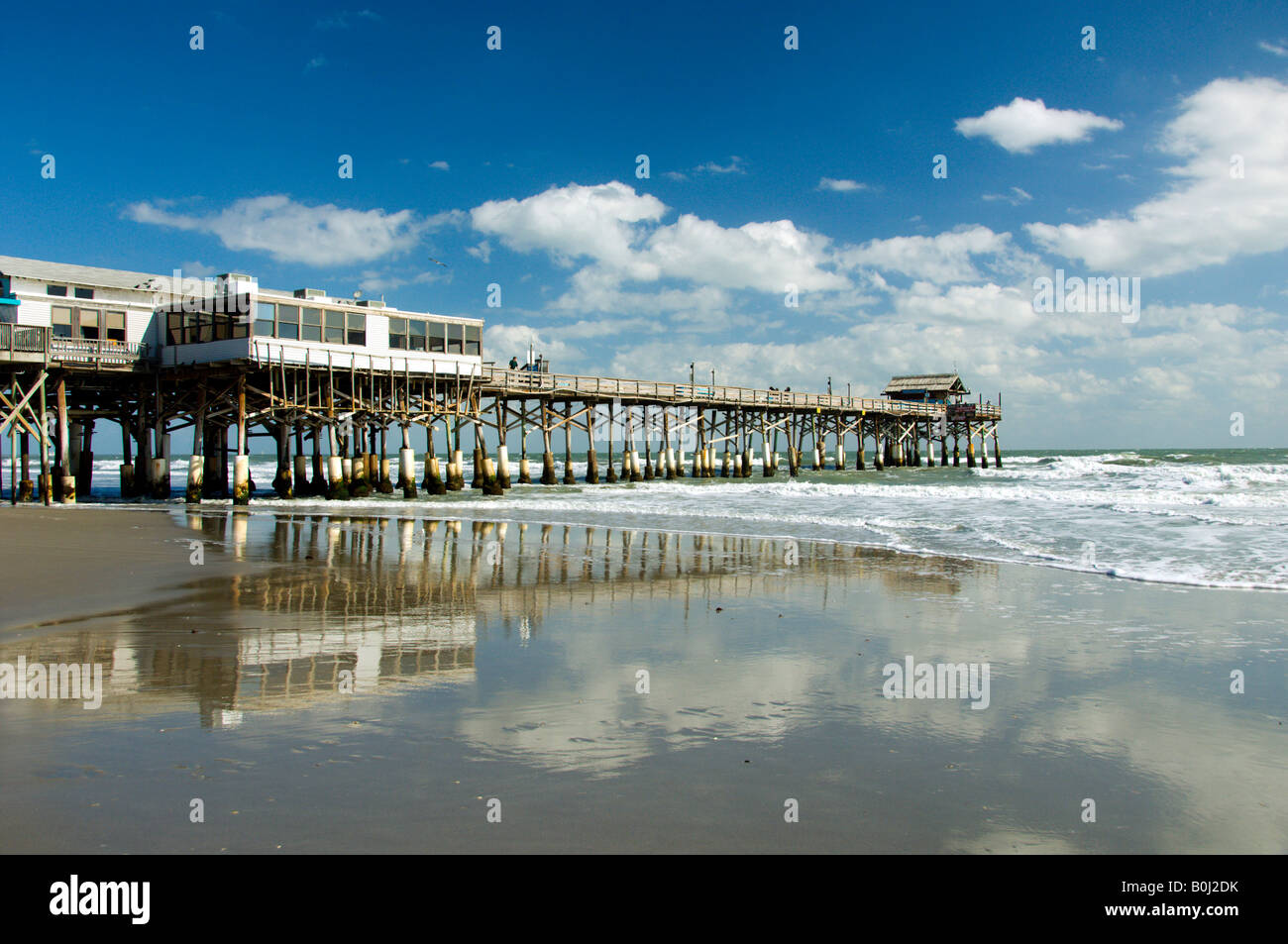 The Cocoa Beach Pier with surf and reflections Cocoa Beach Florida USA Stock Photo