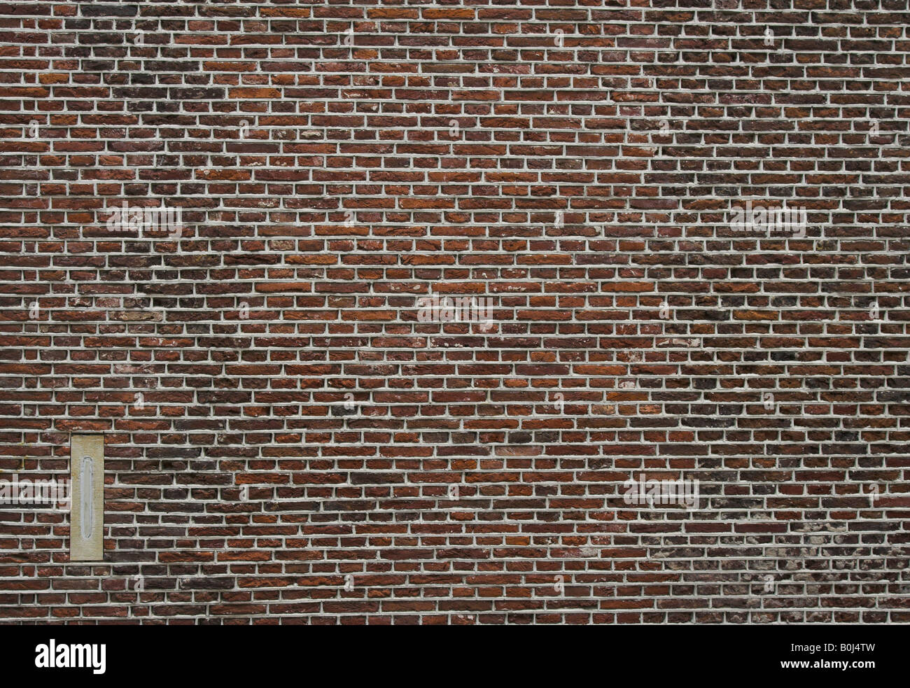Abstract photograph of traditional textured red brick wall in fine