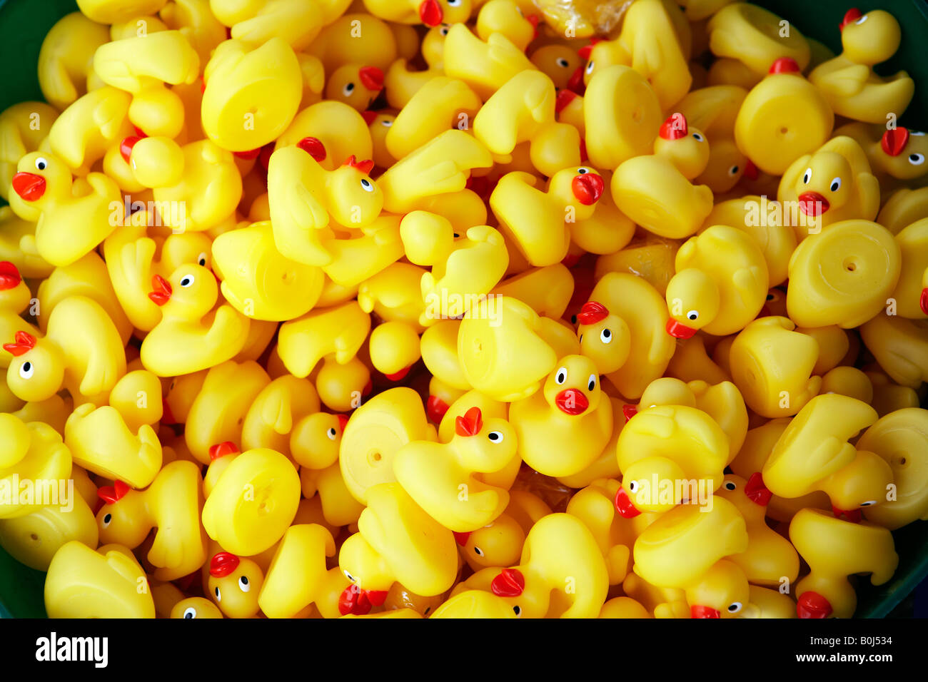 Download Small Yellow Rubber Ducks In A Bucket Stock Photo Alamy PSD Mockup Templates