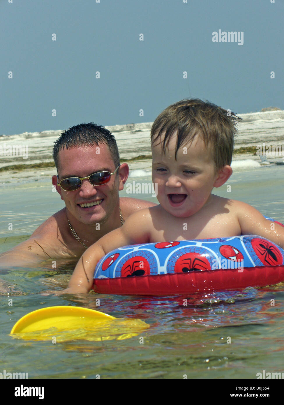 Boy with dad Stock Photo - Alamy
