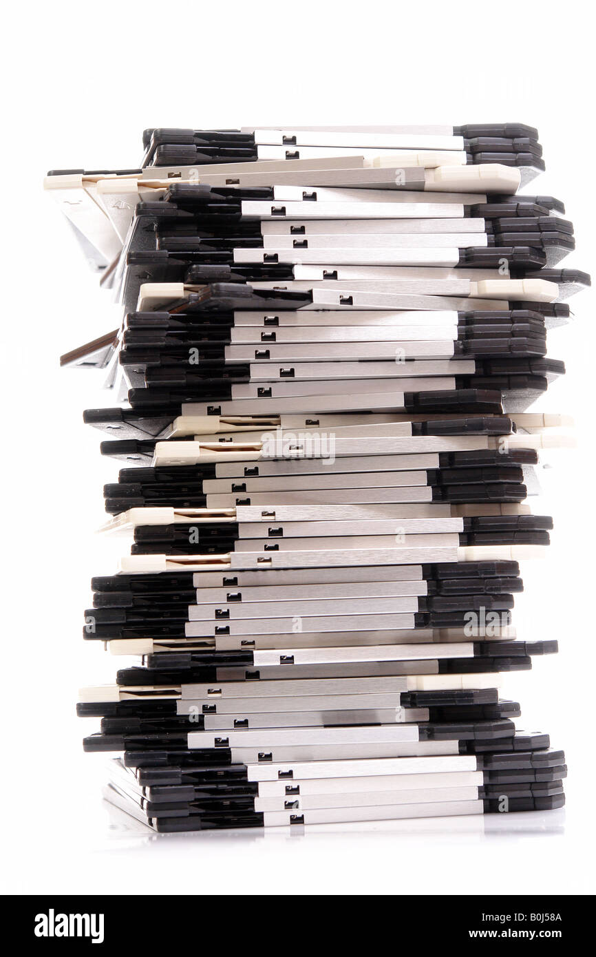 Pile of floppy disks over white Stock Photo