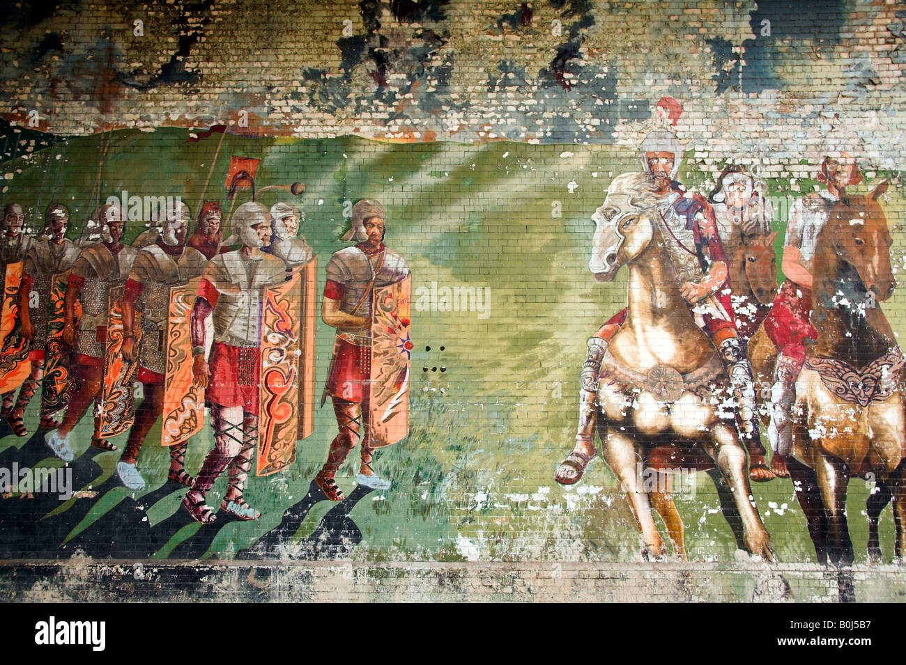 Painted mural of soldiers on a wall, Beaufort Street, Castlefield, Manchester, UK Stock Photo