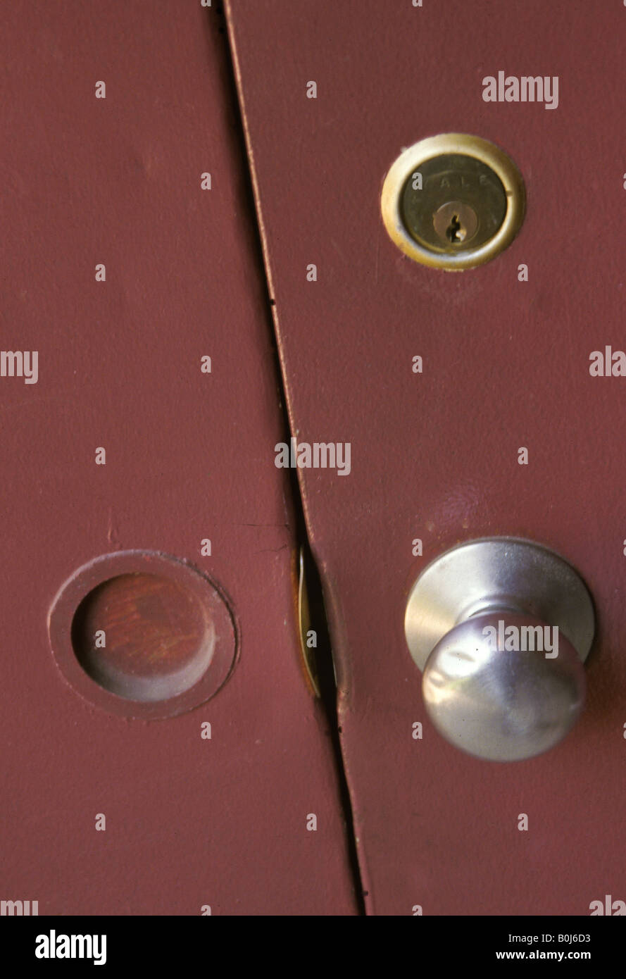 close up metal door knob lock on commercial building Stock Photo
