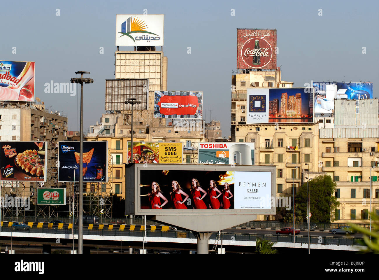 View of advertising hoardings on buildings in central Cairo Egypt Stock Photo