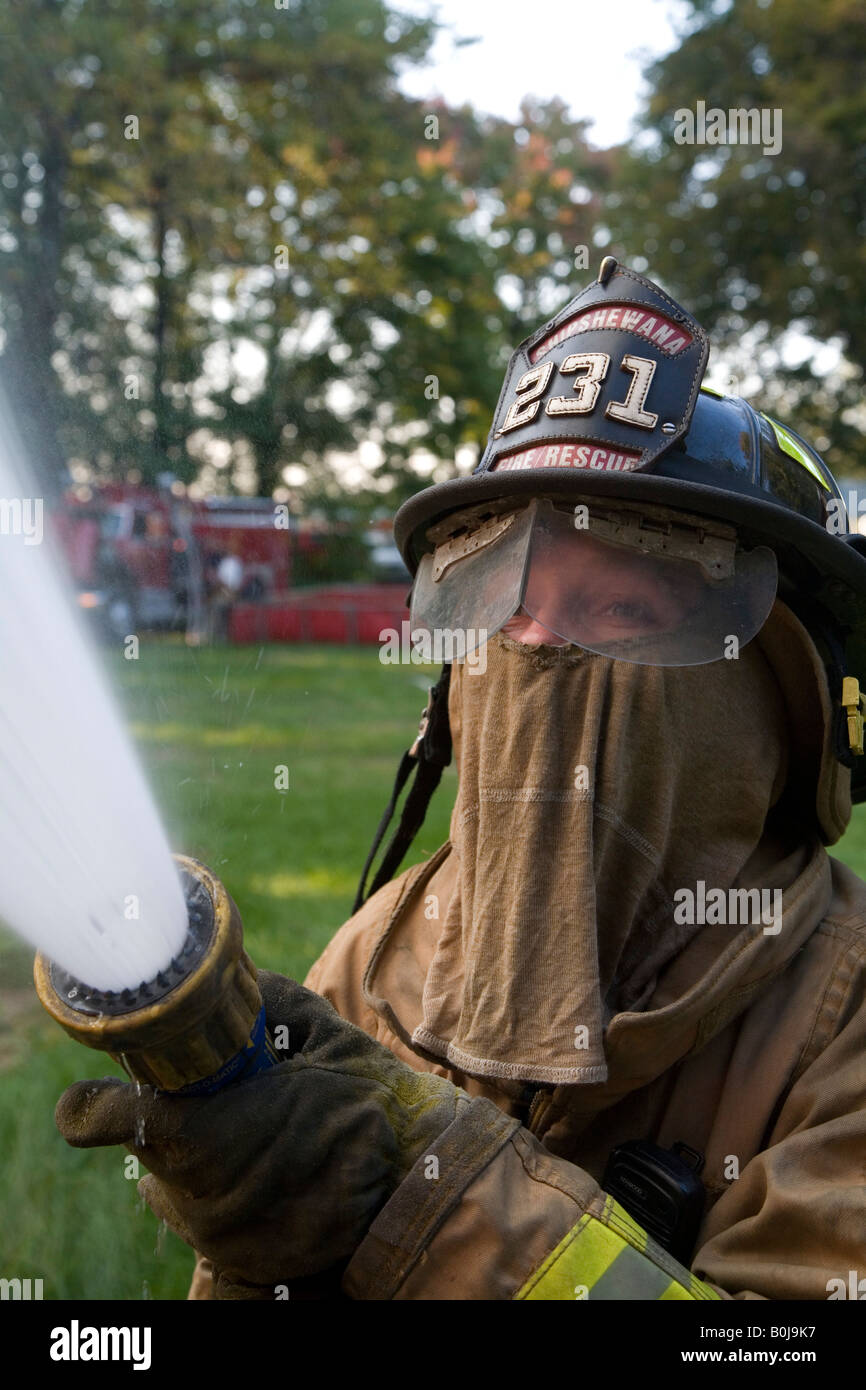 Female Volunteer Firefighter Stock Photo