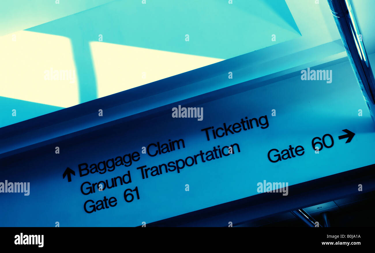 Directions to various points in an airport Stock Photo Alamy