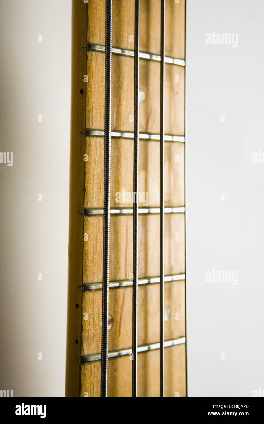 Electric bass guitar with four strings Stock Photo - Alamy