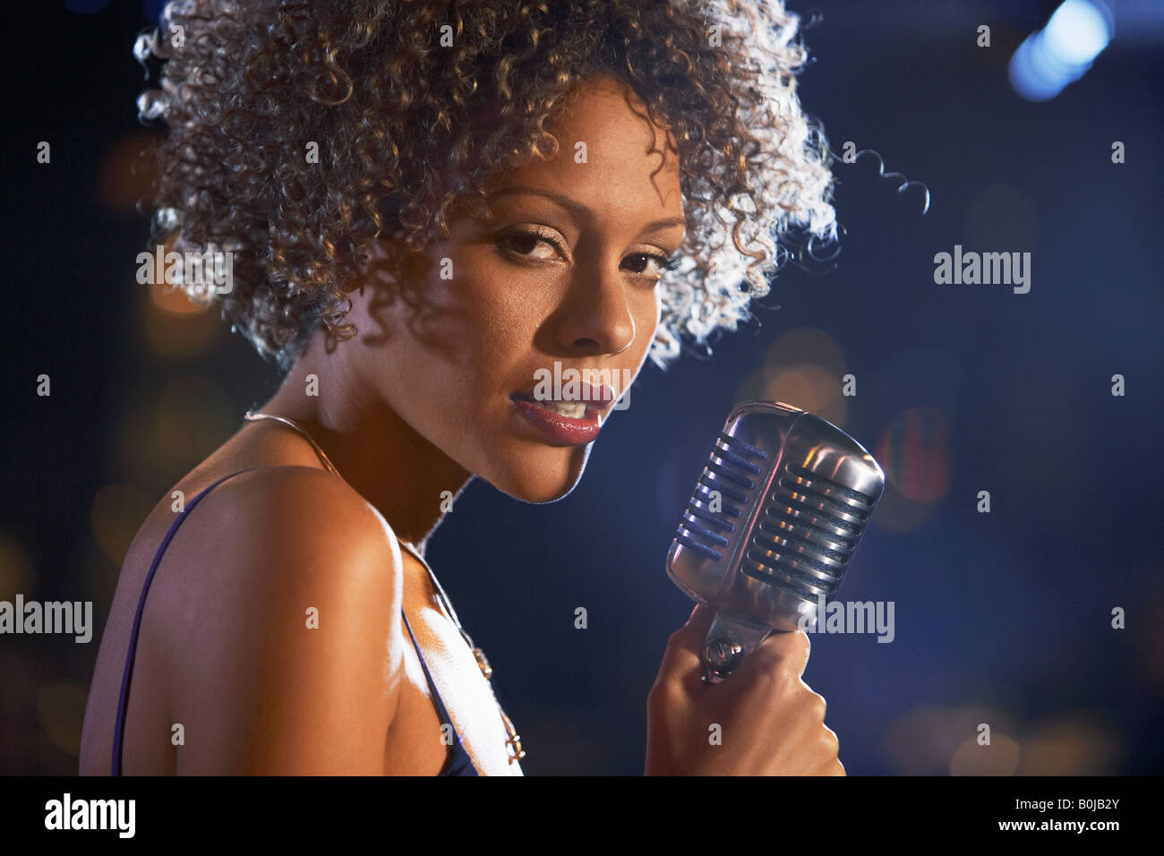 Jazz Singer Performing in Club Stock Photo