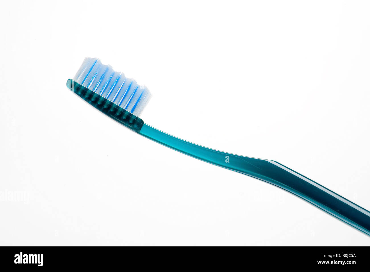 Toothbrush on a white background Stock Photo - Alamy
