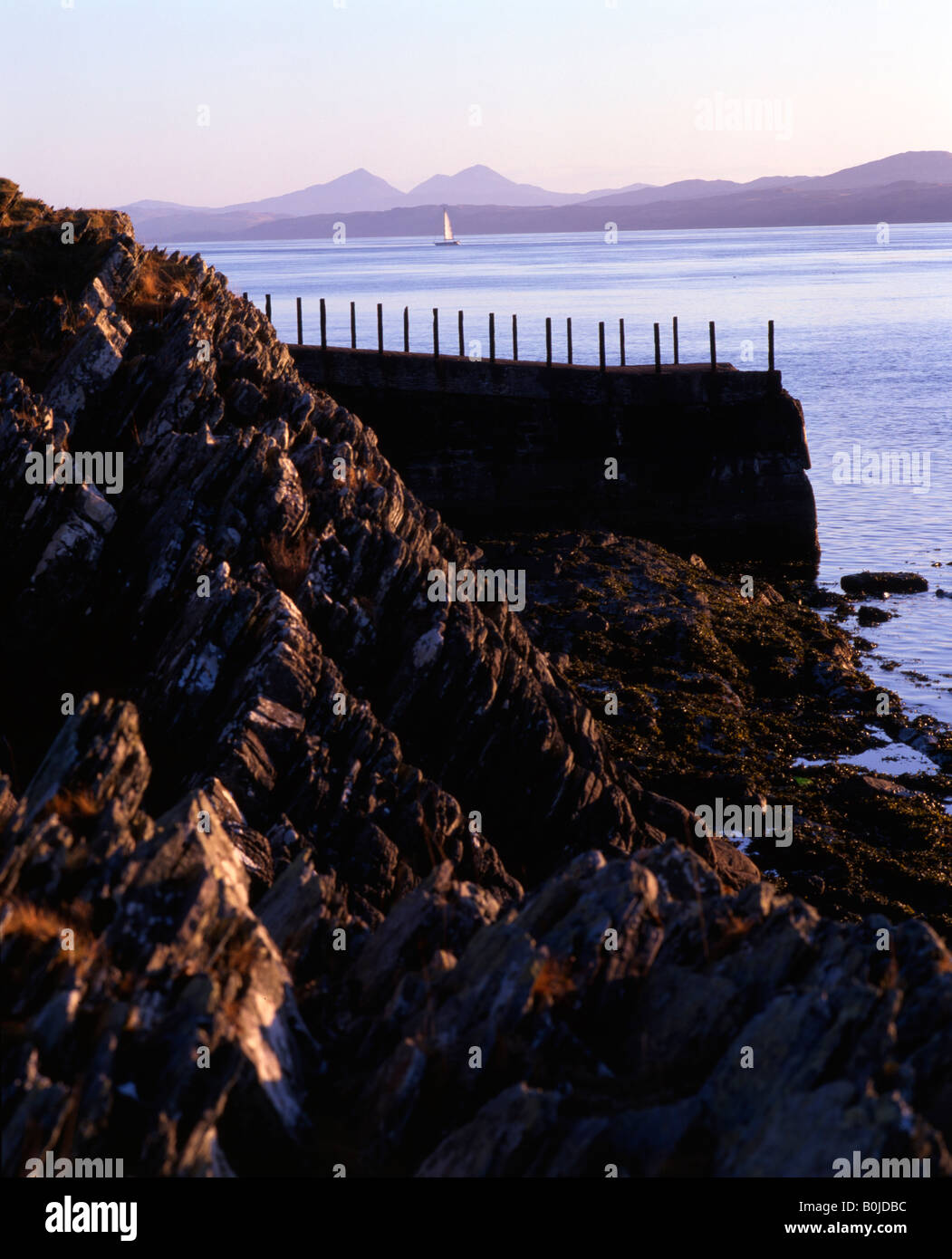 Steamer Pier, Craignish Peninsula with the Paps of Jura beyond. Ardfern, Argyll, Scotland, UK