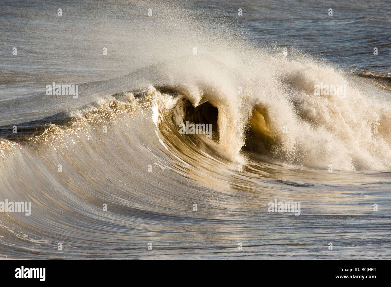 breaking waves North Norfolk Stock Photo