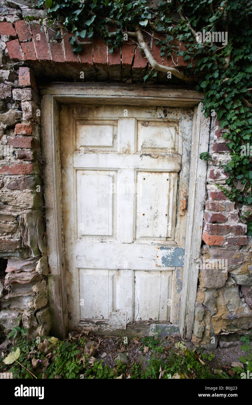 Old doorway in a walled garden Stock Photo