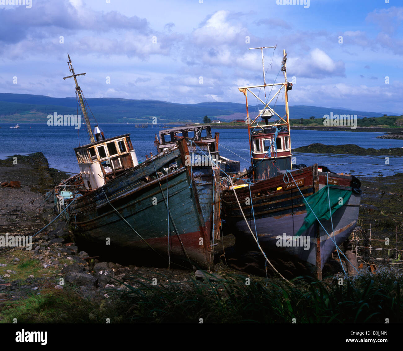Old boats on the shore at Salen, Isle of Mull, Scotland, UK Stock Photo ...