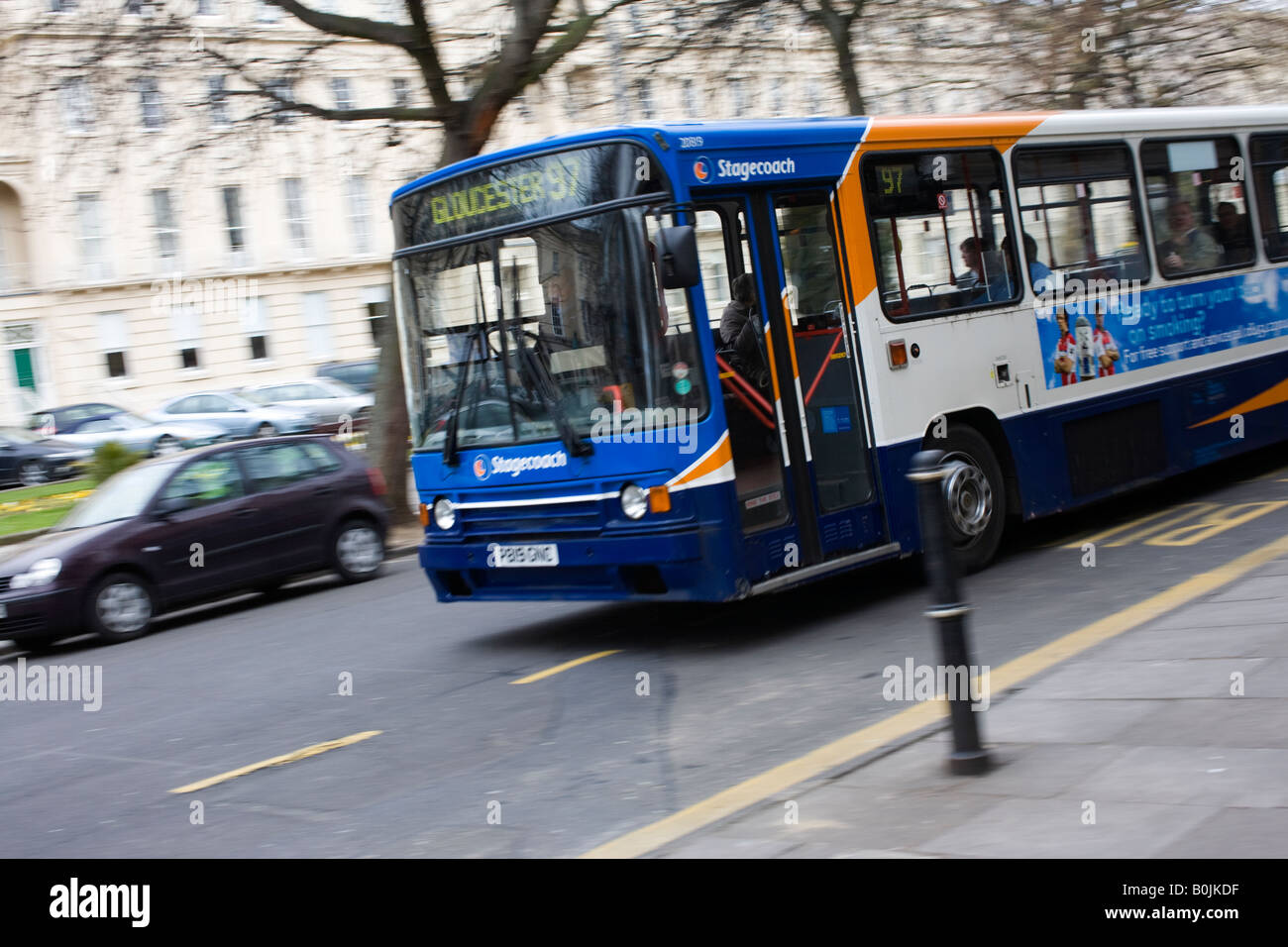 Blurred bus in Cheltenham town centre, UK Stock Photo