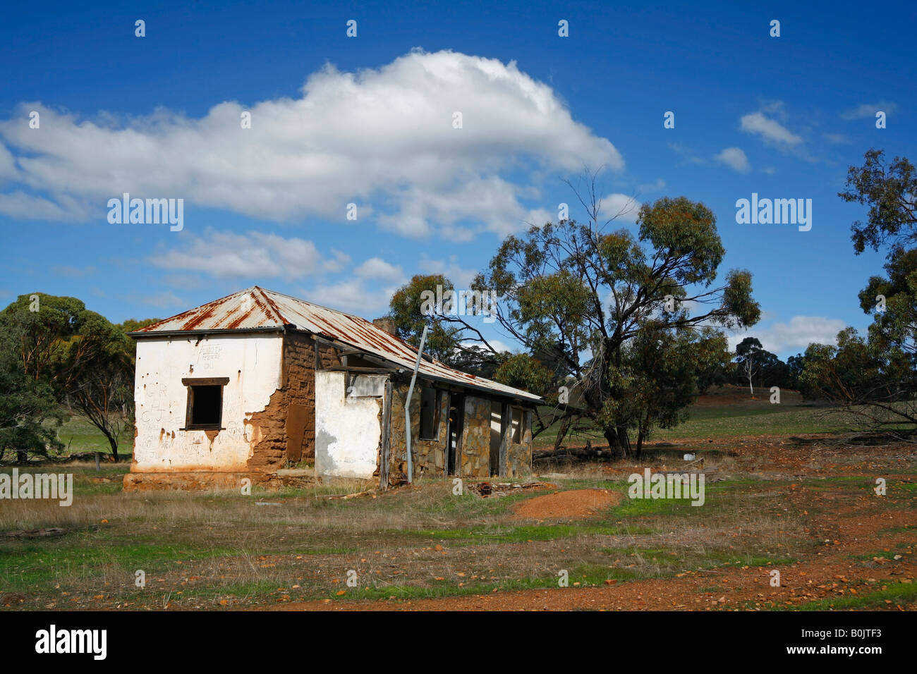 ruins of an old farmhouse in an Australian countryside field or paddock
