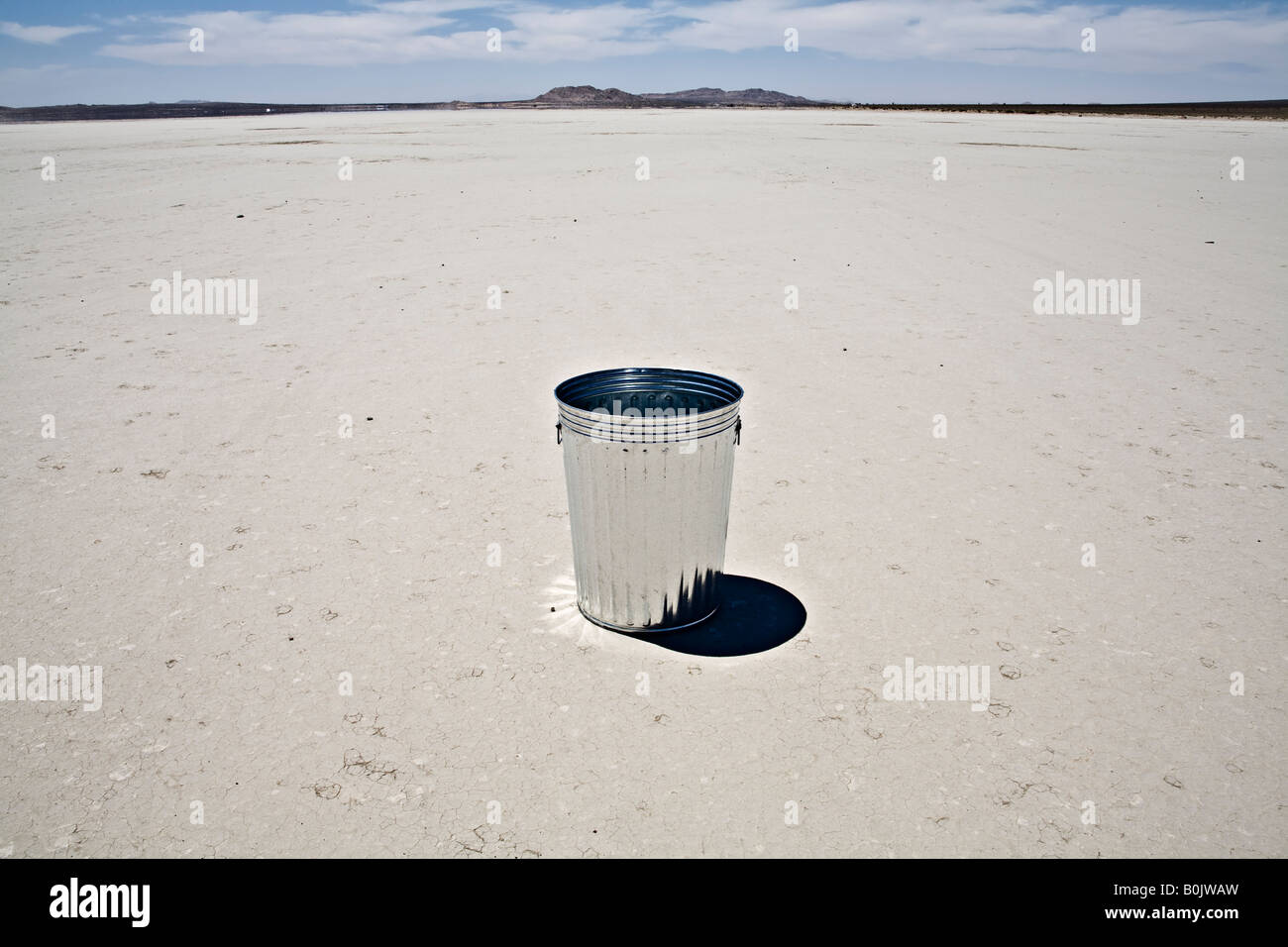 Trashcan in the desertTrashcan in the desert Stock Photo