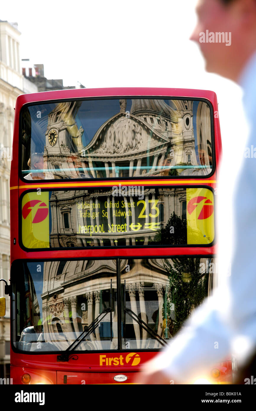 St. Paul's Cathedral, City of London, UK reflected the window of a double decker bus Stock Photo
