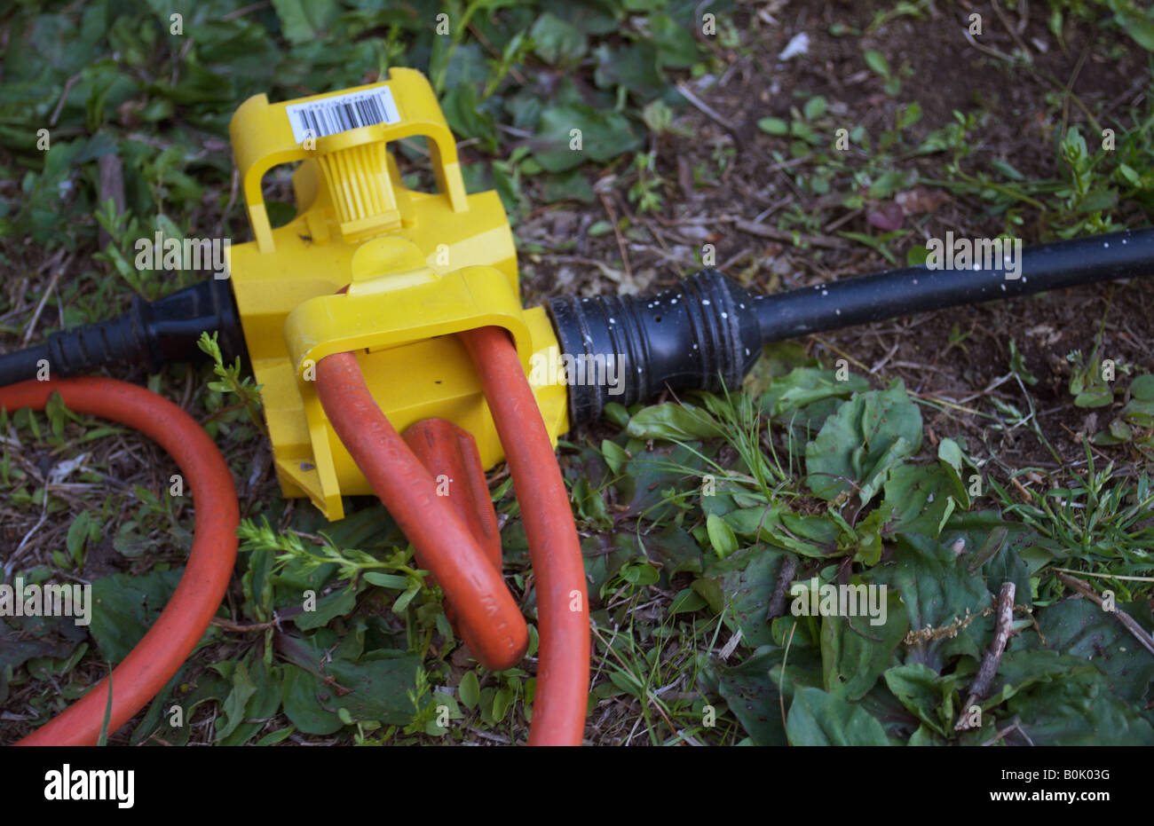 heavy duty extension cord on the ground Stock Photo Alamy