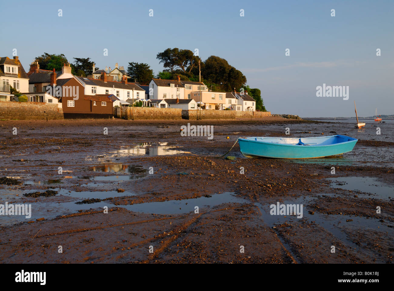 Boat on the Exe Estuary at low tide, Lympstone, near Exeter, Devon, UK Stock Photo