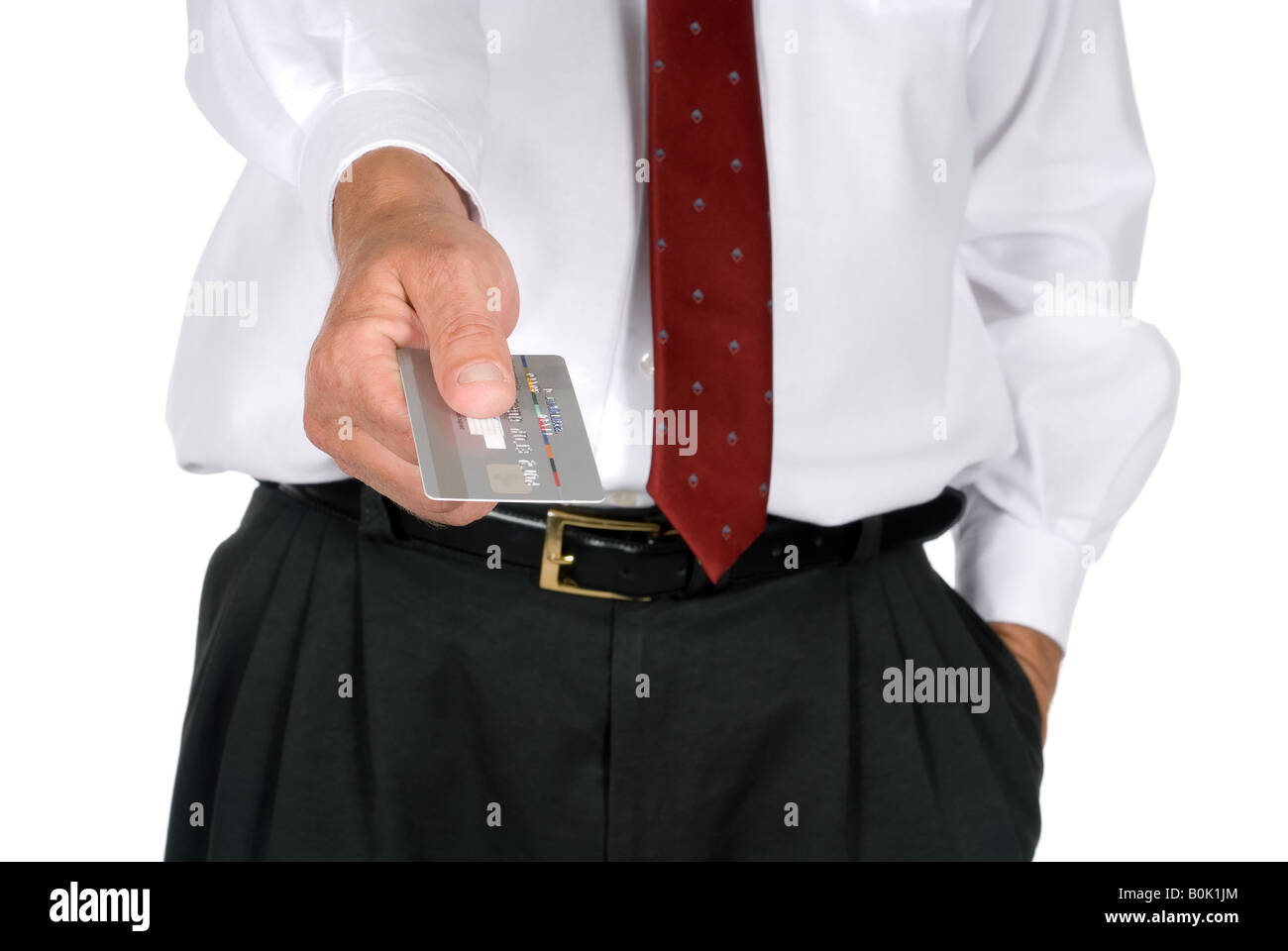 Business man handing over credit card Stock Photo