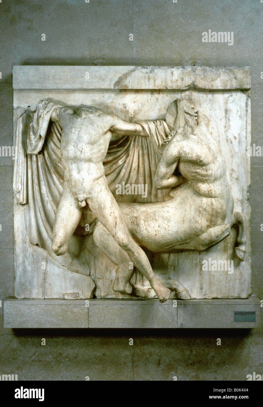 A fight between a human Lapith and a Centaur, metope from the Parthenon, c440 BC. Artist: Unknown Stock Photo
