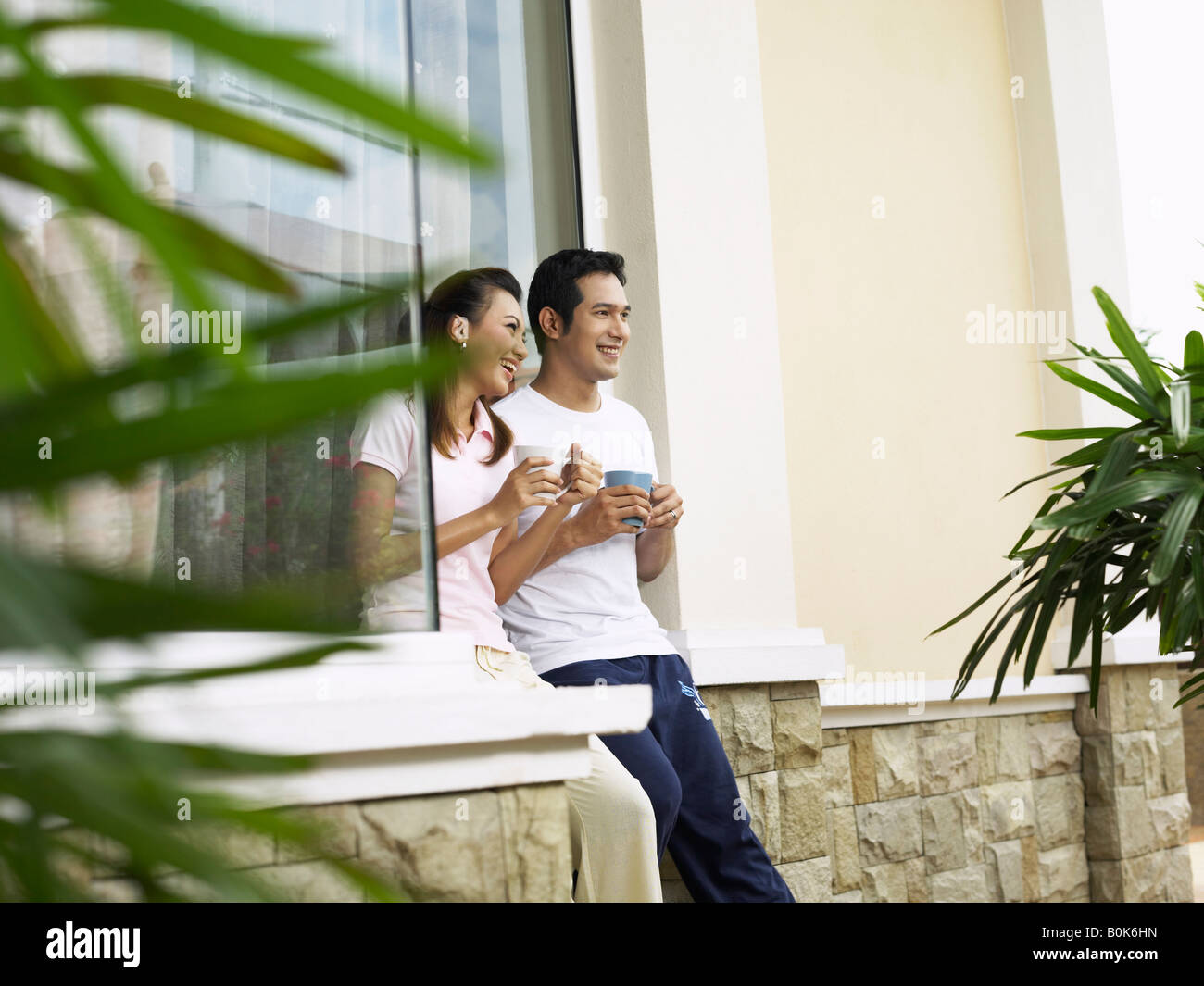 Wife and husband looking away Stock Photo