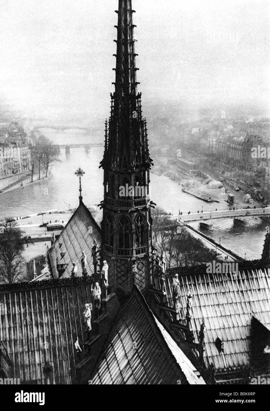 The spire of Notre Dame seen from the towers, Paris, 1931.Artist: Ernest Flammarion Stock Photo
