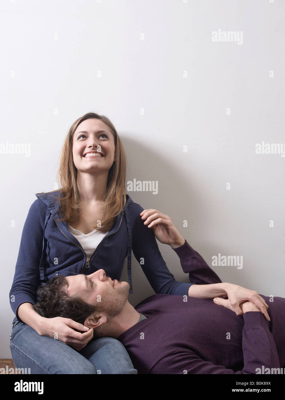 Man lying on womans lap hires stock photography and images Alamy