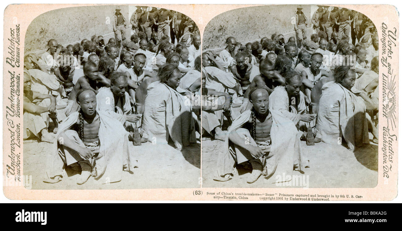 Boxer prisoners captured and brought in by the US 6th Cavalry, Tientsin, China, 1901.Artist: Underwood & Underwood Stock Photo