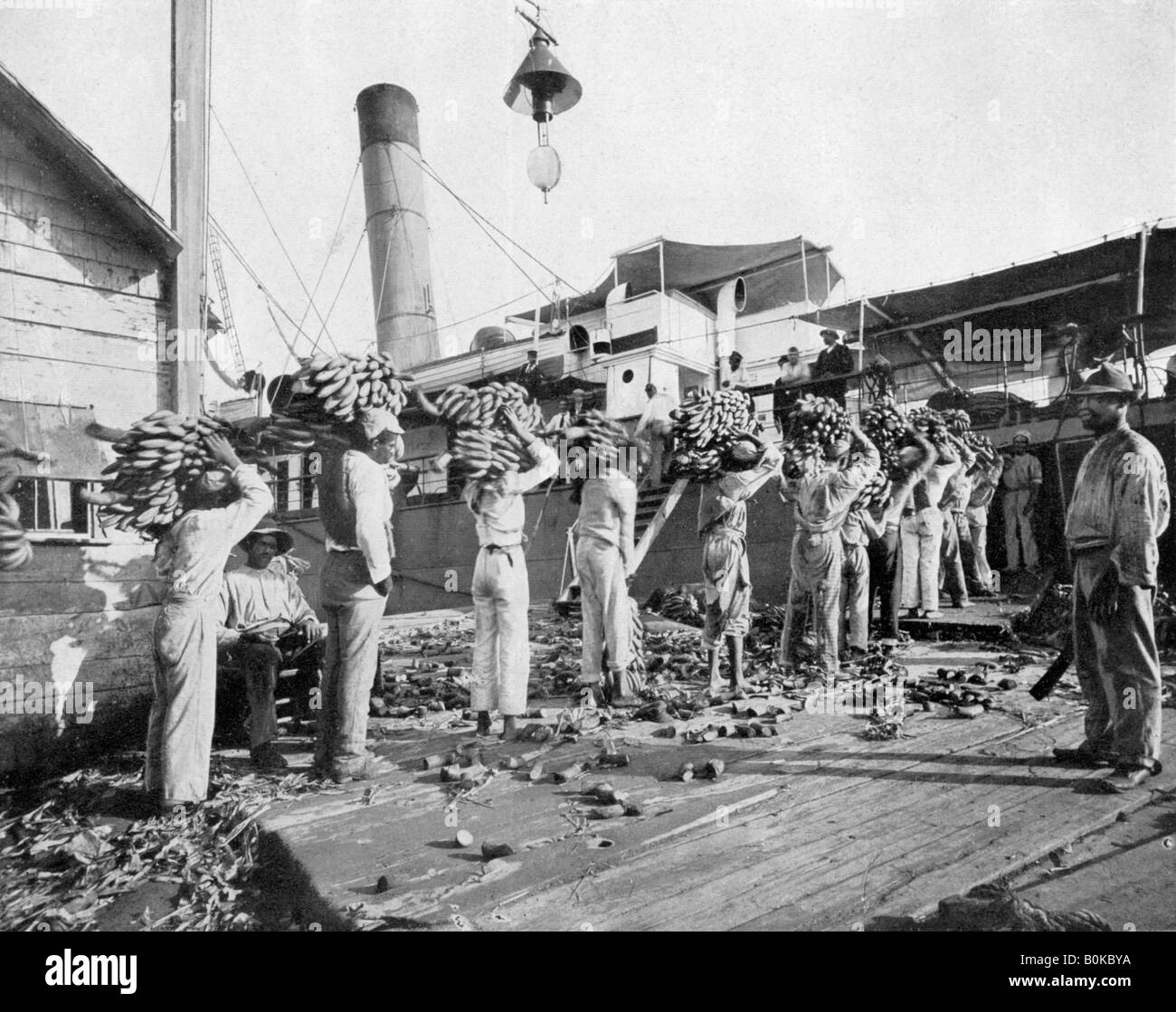 Loading bananas, Port Antonio, Jamaica, c1905.Artist Adolphe Duperly