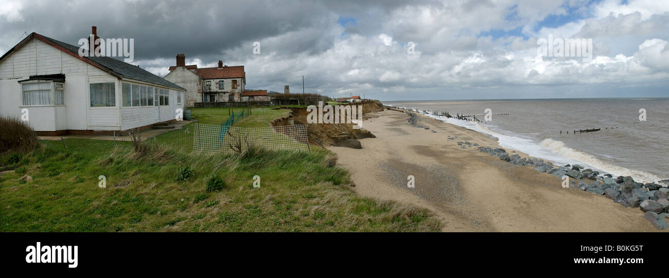 Britain uk England Coastal Erosion erosion Beach Sea Global warming Happisburgh Norfolk Dramatic Fall Cliff Homes Insurance Stock Photo