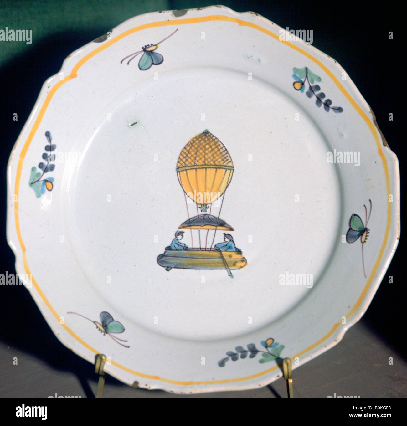 A French faience plate depicting Jean-Pierre Blanchard's balloon trip. Artist: Unknown Stock Photo