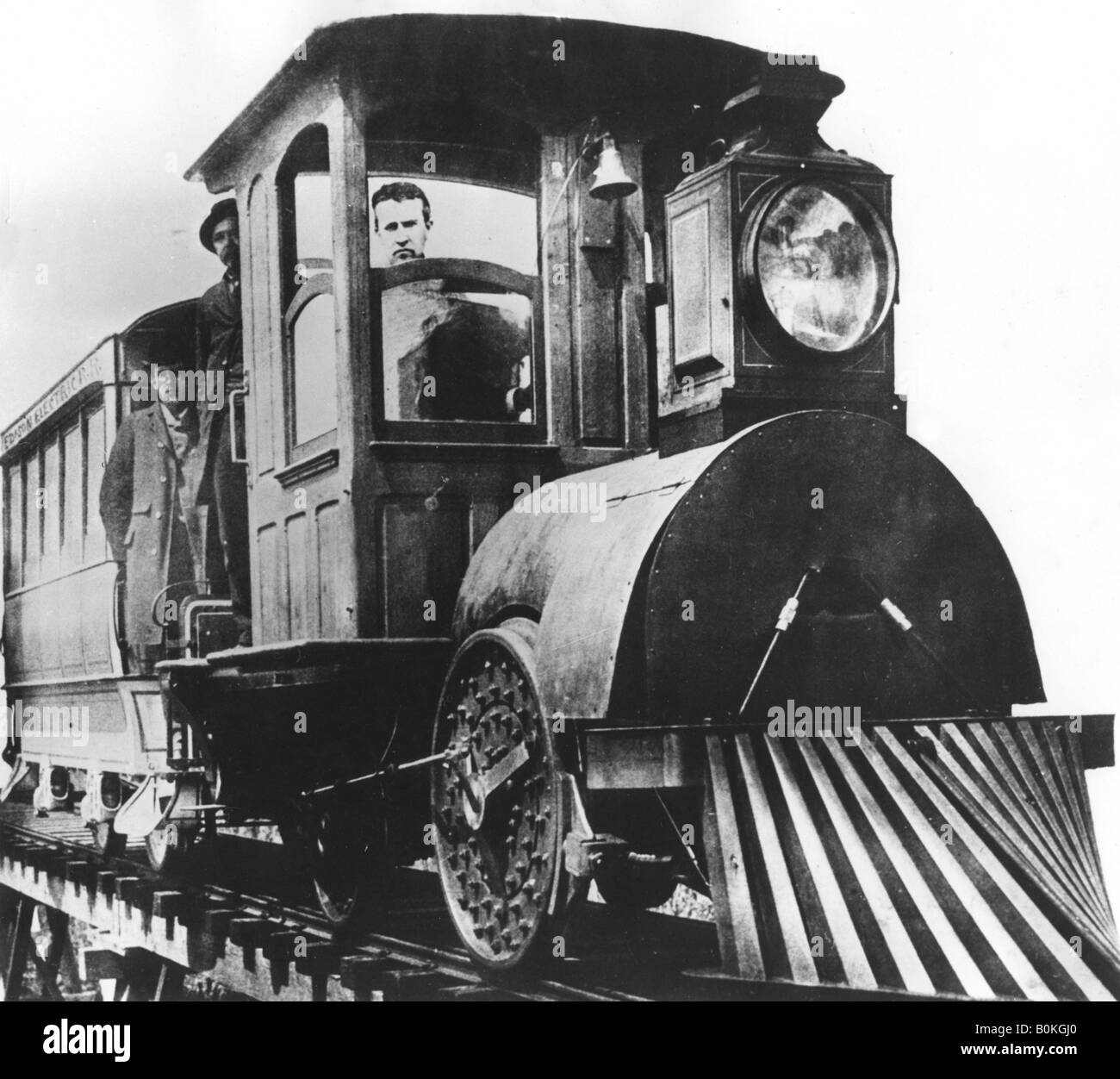 American inventor Thomas Alva Edison on board an electric railroad, 1892. Artist: Unknown Stock Photo